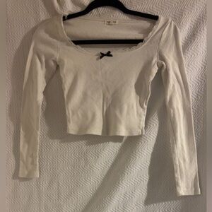 Cream Long Sleeve Bodysuit with Black Bow